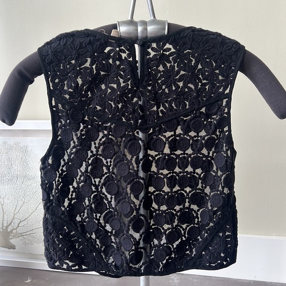 Lace sleeveless top. Wear over a turtleneck or solo. Flirty and playful. - Picture 2 of 6